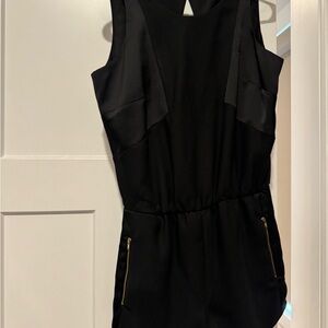 Parker Chic Black Sleeveless Romper with Gold Zippers